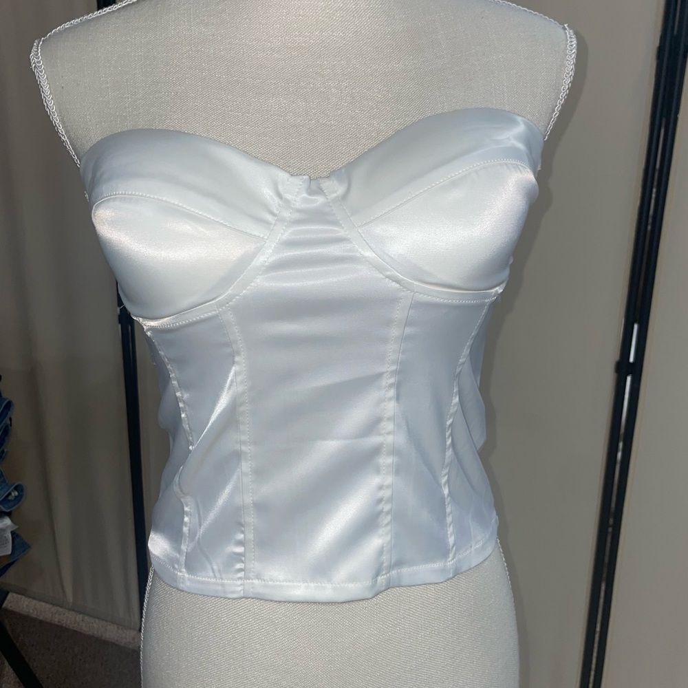 Corset top with zipper back and adhesive breast area